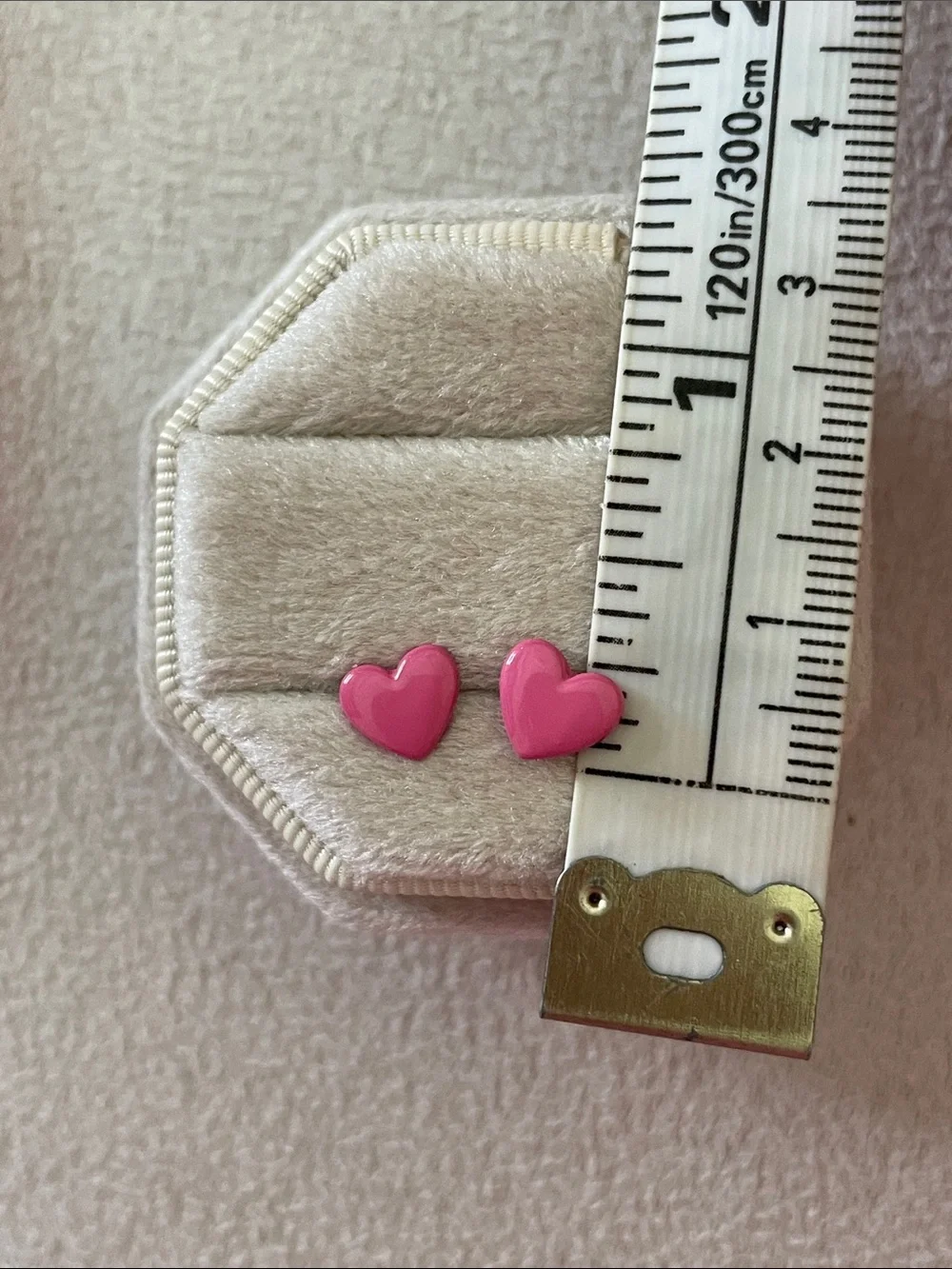 Pink heart shaped stud earrings